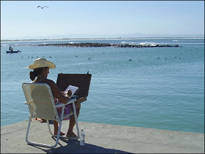 Linda painting at Struisbaai harbour